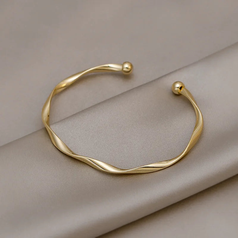 Minimalist Twisted Charm Cuff Bracelet