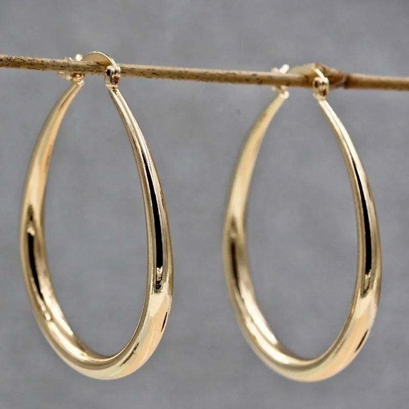Shiny Elongated Smooth Hoop Earrings
