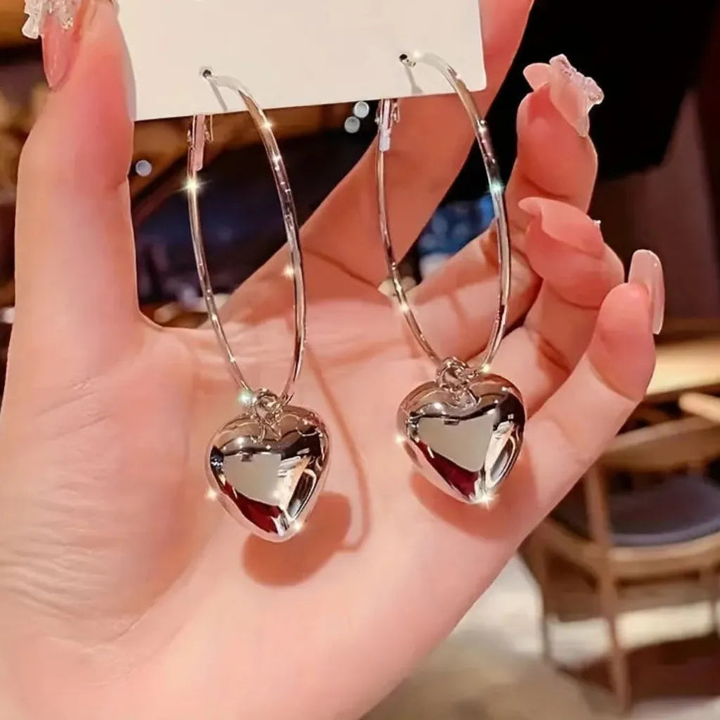 Stunning Heart Hollow Hoop Earrings