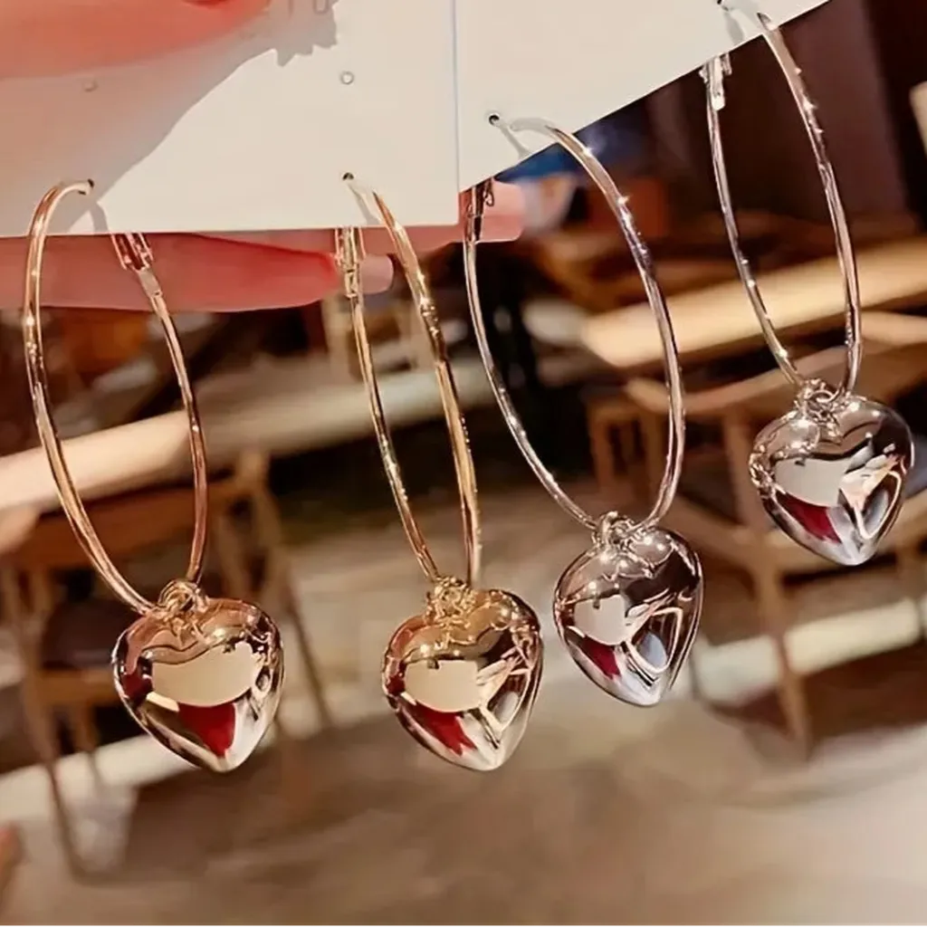 Stunning Heart Hollow Hoop Earrings